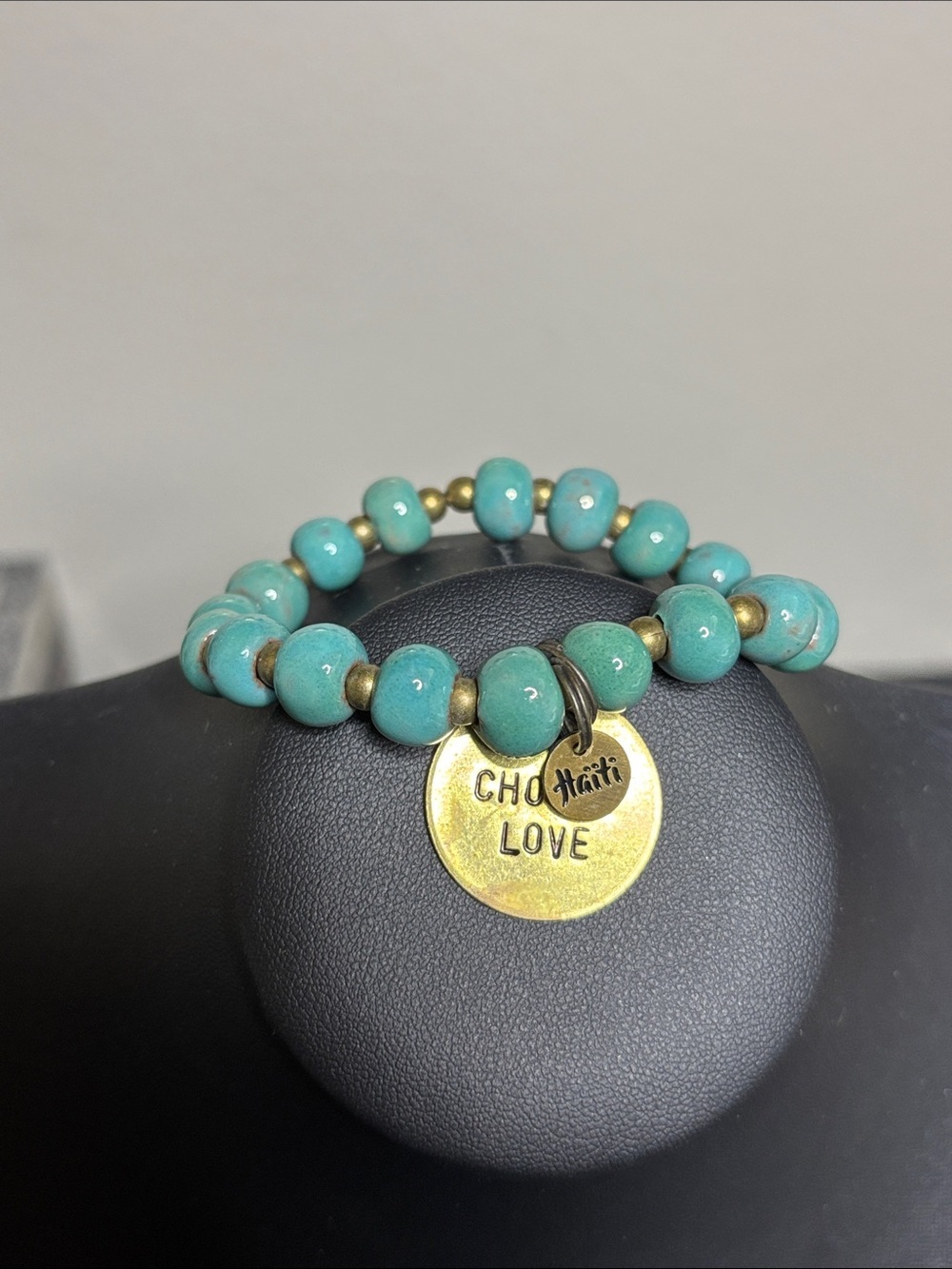 Bel Koz Haiti Handcrafted Turquoise Beaded Stretch Bracelet Brass Charm